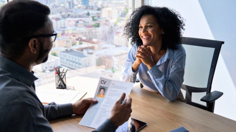 young woman smiling during job interview