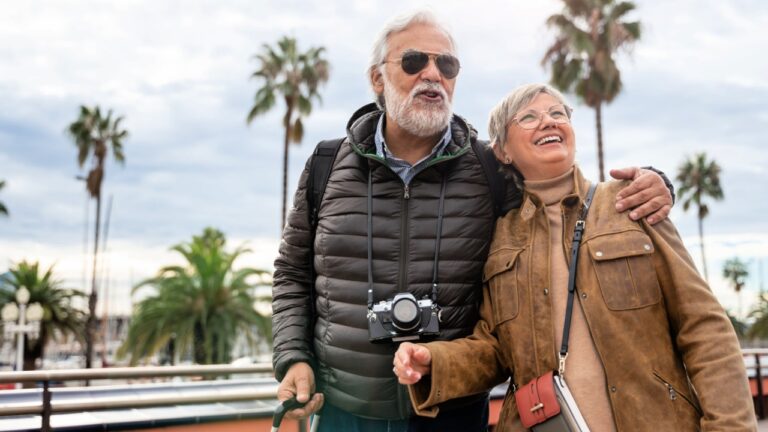 old couple tourists traveling together