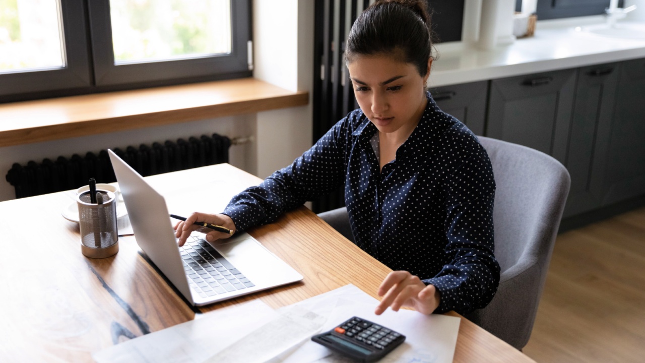 woman professional accountant preparing annual financial report